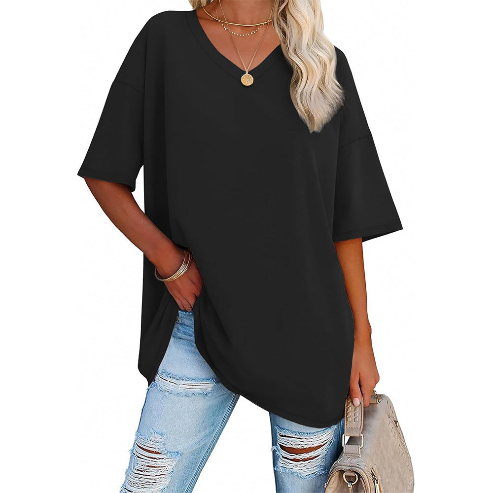 Damoversized T-shirt med V-ringning och sidofickor Mirla-Eva Jonsson