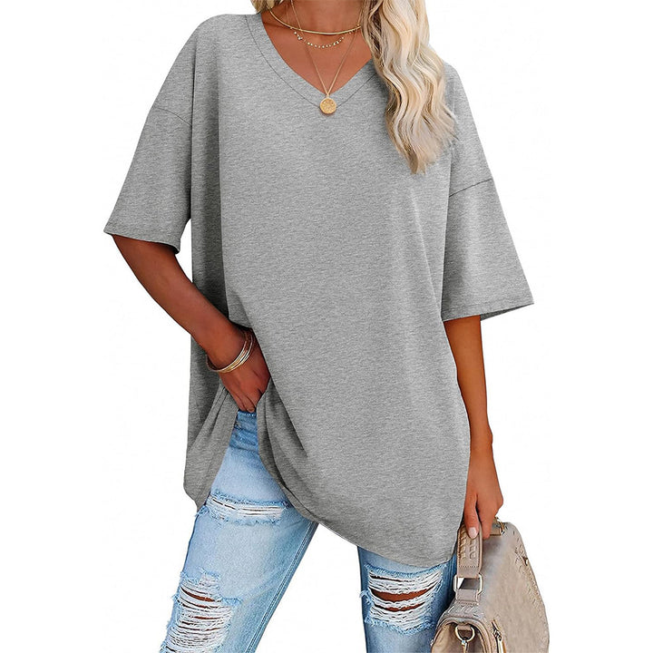 Damoversized T-shirt med V-ringning och sidofickor Mirla-Eva Jonsson