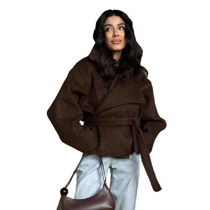 Damren Oversized Ulljacka med bindebälte och avslappnad passform Mirla-Eva Jonsson