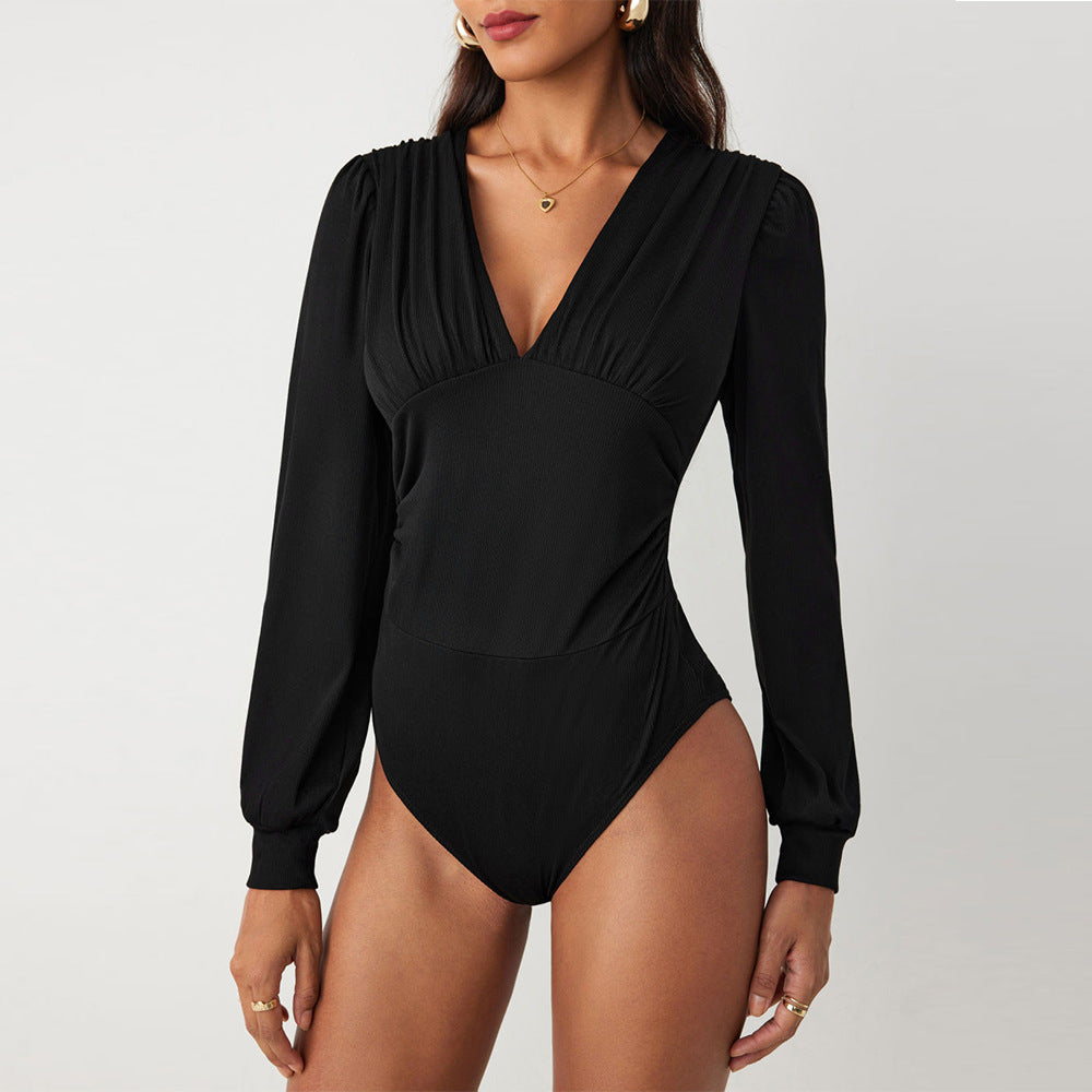 Dams Body med eleganta puffärmar och djup V-urringning Mirla-Eva Jonsson