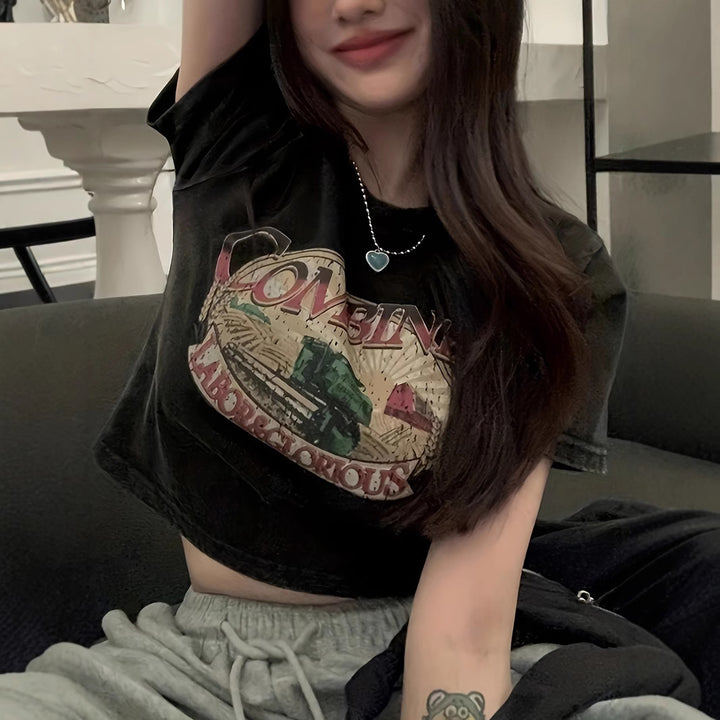 Dams Crop-T-Shirt med kreativt ögonmotiv och turnétryck Mirla-Eva Jonsson