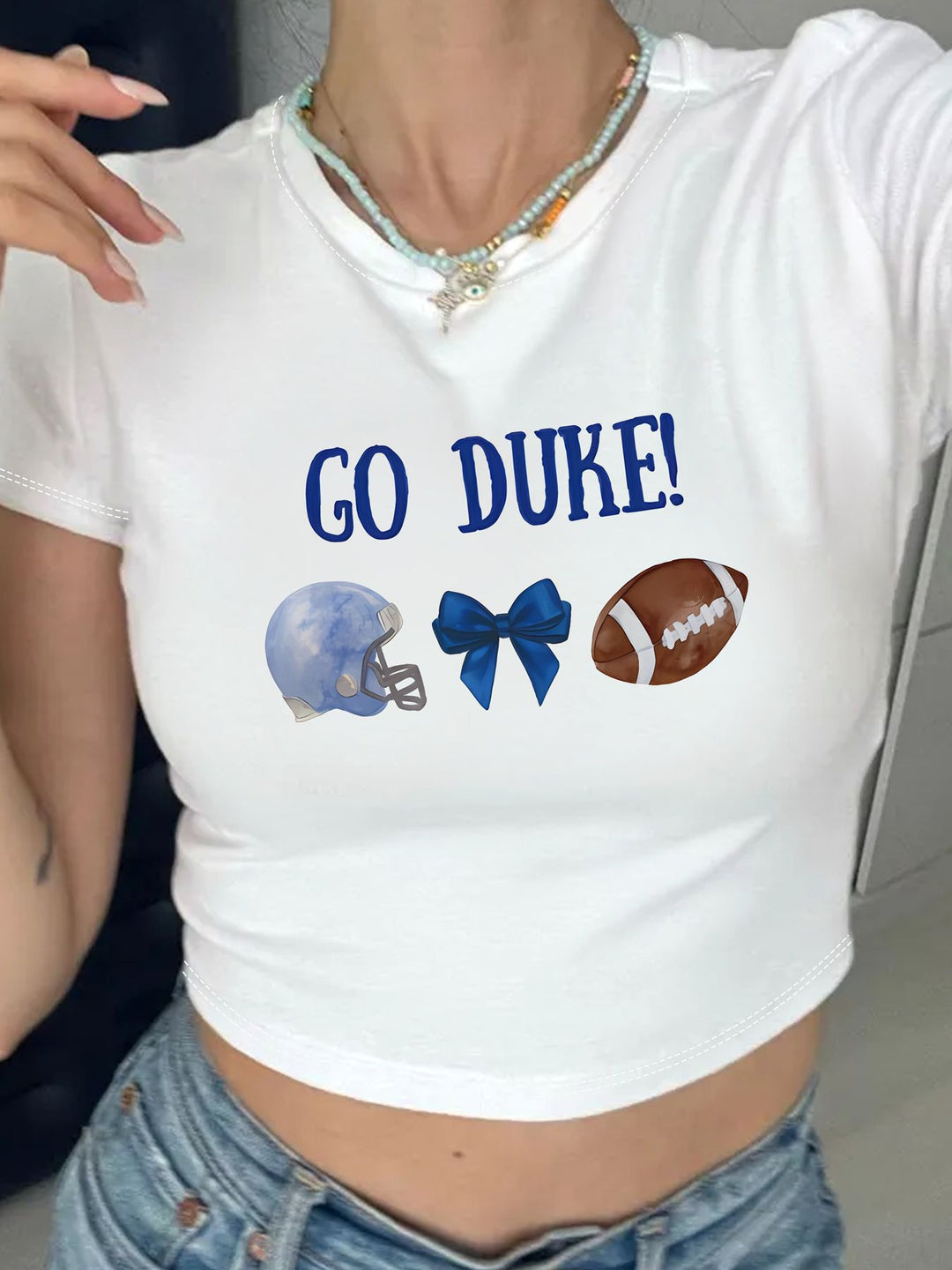Dams Crop-T-Shirt med kreativt ögonmotiv och turnétryck Mirla-Eva Jonsson
