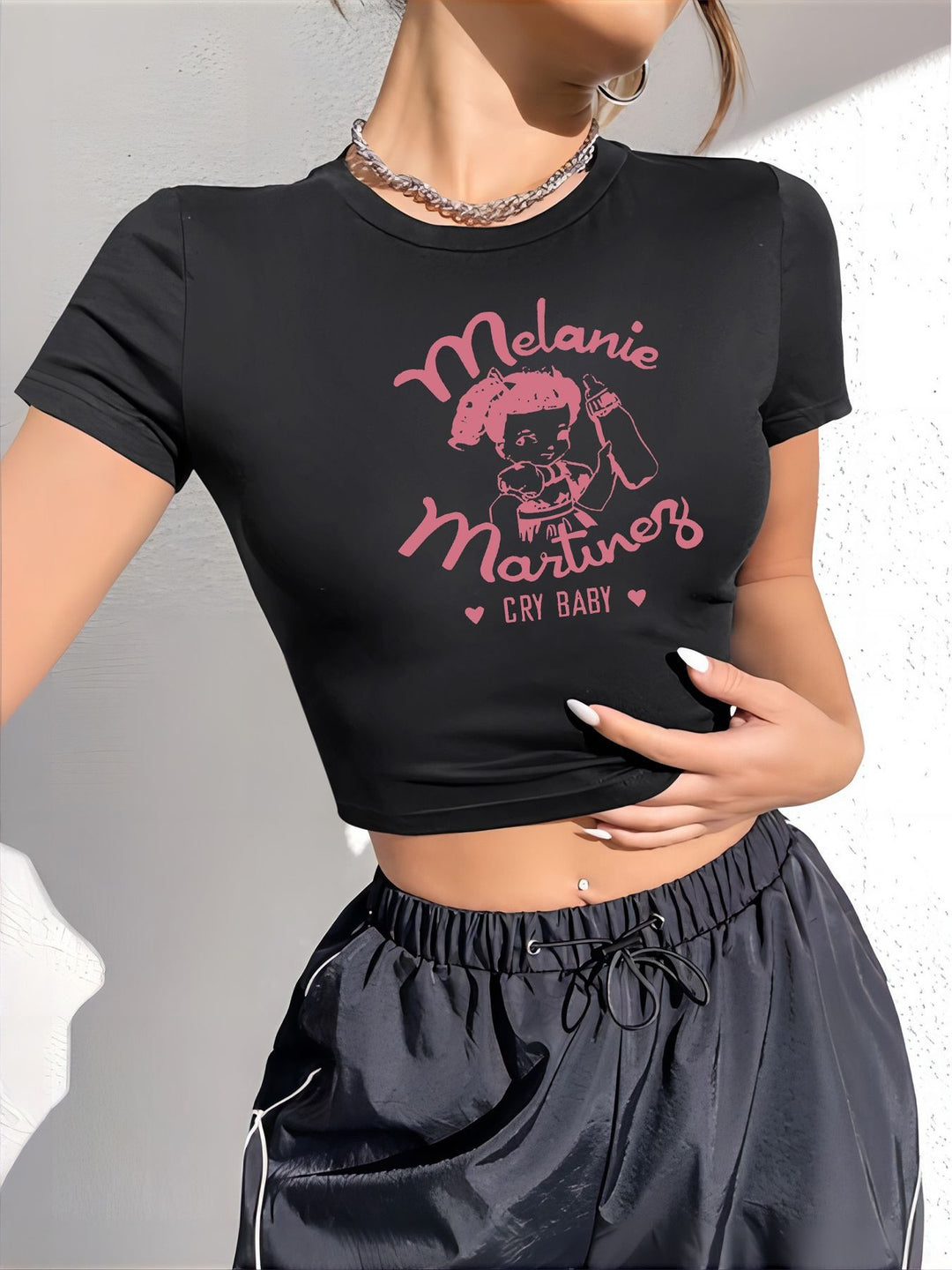 Dams Crop-T-Shirt med kreativt ögonmotiv och turnétryck Mirla-Eva Jonsson