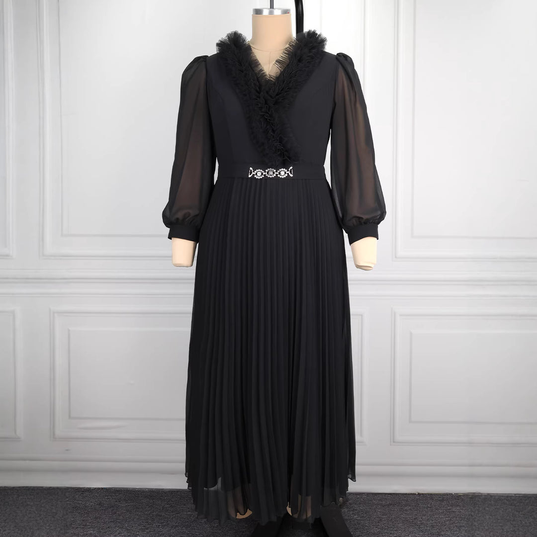Dams Elegant plisserad midi-klänning med volangdetaljer Mirla-Eva Jonsson