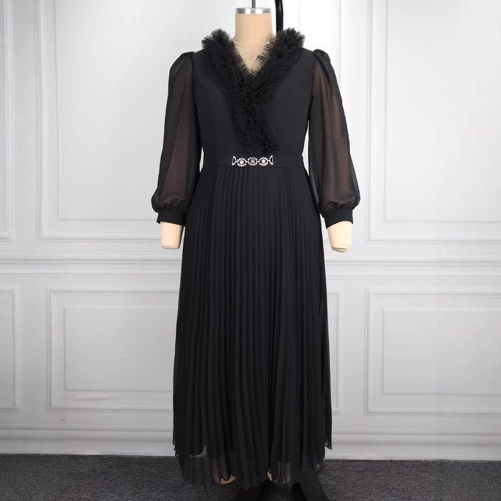 Dams Elegant plisserad midi-klänning med volangdetaljer Mirla-Eva Jonsson