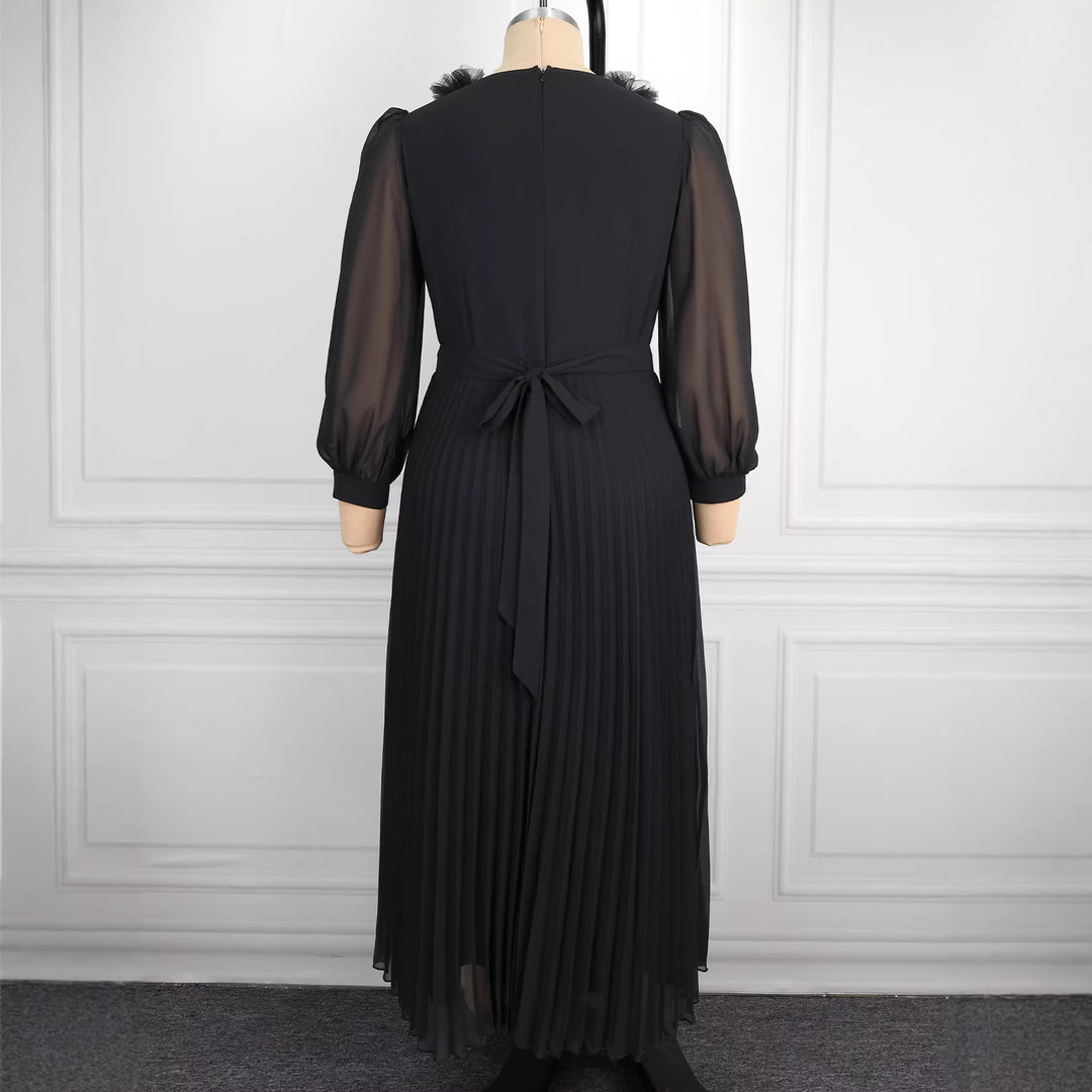 Dams Elegant plisserad midi-klänning med volangdetaljer Mirla-Eva Jonsson
