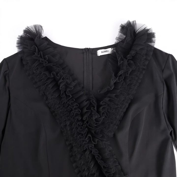 Dams Elegant plisserad midi-klänning med volangdetaljer Mirla-Eva Jonsson