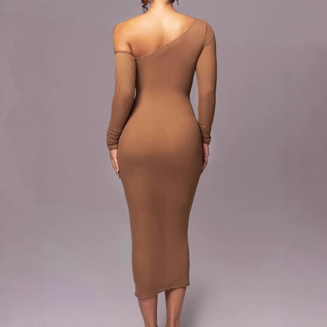Dams Figurformande Wickelkleid med asymmetrisk skärning och raffinerade volangdetaljer Mirla-Eva Jonsson