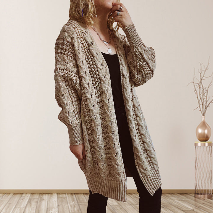 Dams Grovstickad jacka med voluminösa ärmar och strukturerad design Eva Jonsson-Eva Jonsson