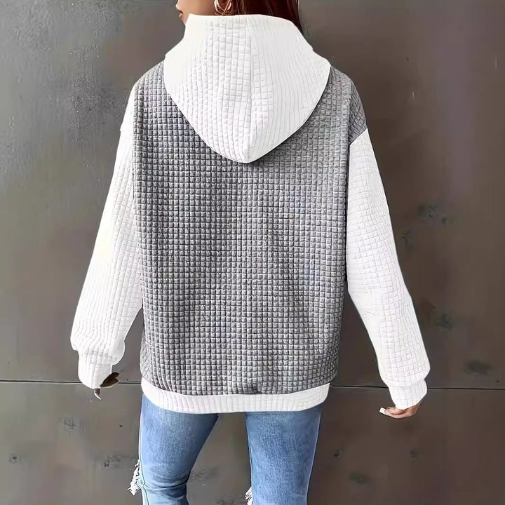 Dams Hoodie med strukturerad design och praktiska sidofickor Mirla-Eva Jonsson