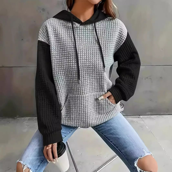 Dams Hoodie med strukturerad design och praktiska sidofickor Mirla-Eva Jonsson