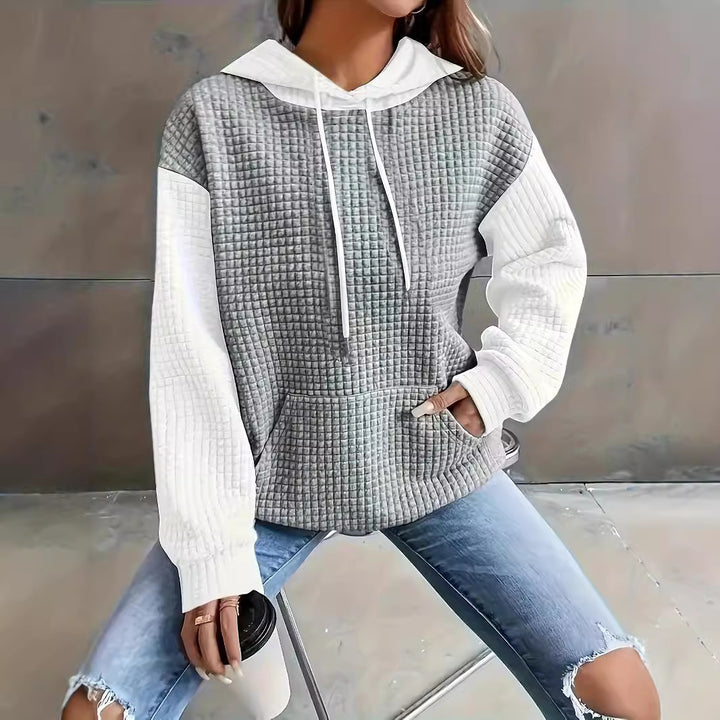 Dams Hoodie med strukturerad design och praktiska sidofickor Mirla-Eva Jonsson