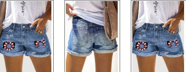 Dams Jeans-shorts med unik blomster-patch och modernt distressed-utseende Mirla-Eva Jonsson
