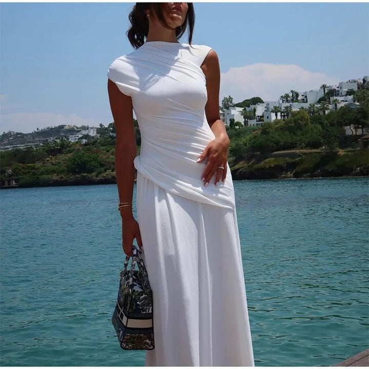 Dams Maxi dress with innovative wrap design and elegant draping Mirla-Eva Jonsson