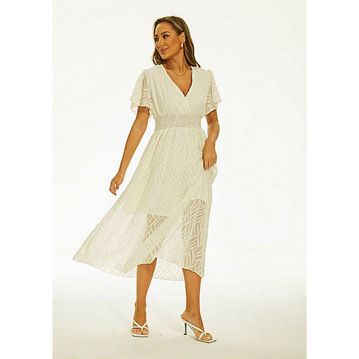 Dams Maxi-klänning med elegant V-ringning och fina volangdetaljer Mirla-Eva Jonsson