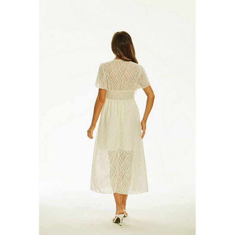 Dams Maxi-klänning med elegant V-ringning och fina volangdetaljer Mirla-Eva Jonsson