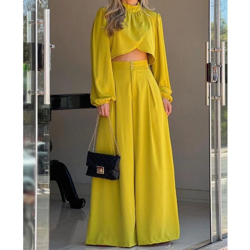 Dams Mode tvådelat set med elegant cropped topp och vida byxor Mirla-Eva Jonsson