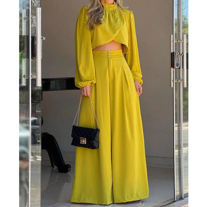 Dams Mode tvådelat set med elegant cropped topp och vida byxor Mirla-Eva Jonsson