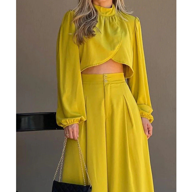 Dams Mode tvådelat set med elegant cropped topp och vida byxor Mirla-Eva Jonsson