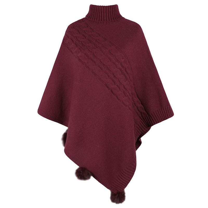 Dams Poncho med modern flätdesign och en hög krage Mirla-Eva Jonsson