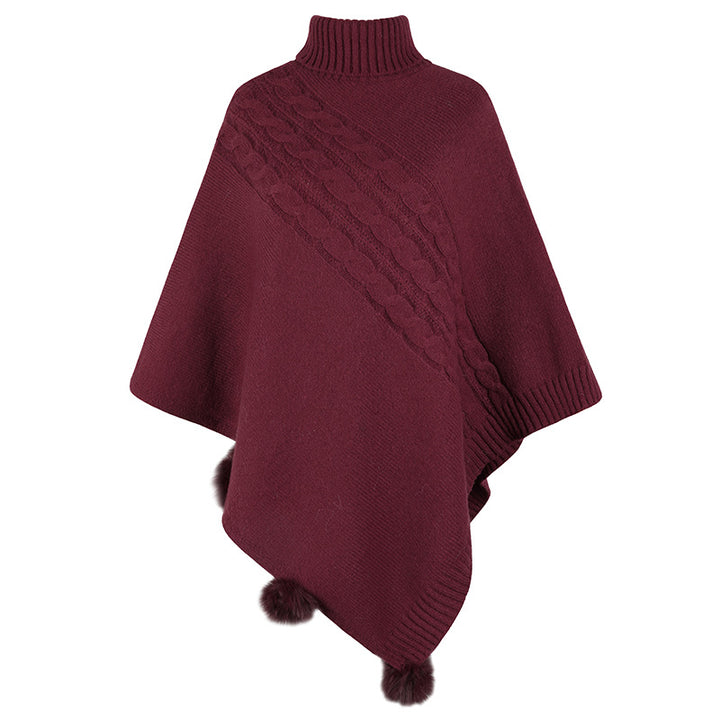 Dams Poncho med modern flätdesign och en hög krage Mirla-Eva Jonsson