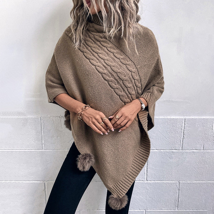 Dams Poncho med modern flätdesign och en hög krage Mirla-Eva Jonsson