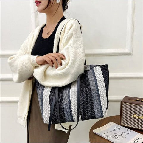 Dams Shopper-väska med moderna ränder och mångsidig insida Mirla-Eva Jonsson