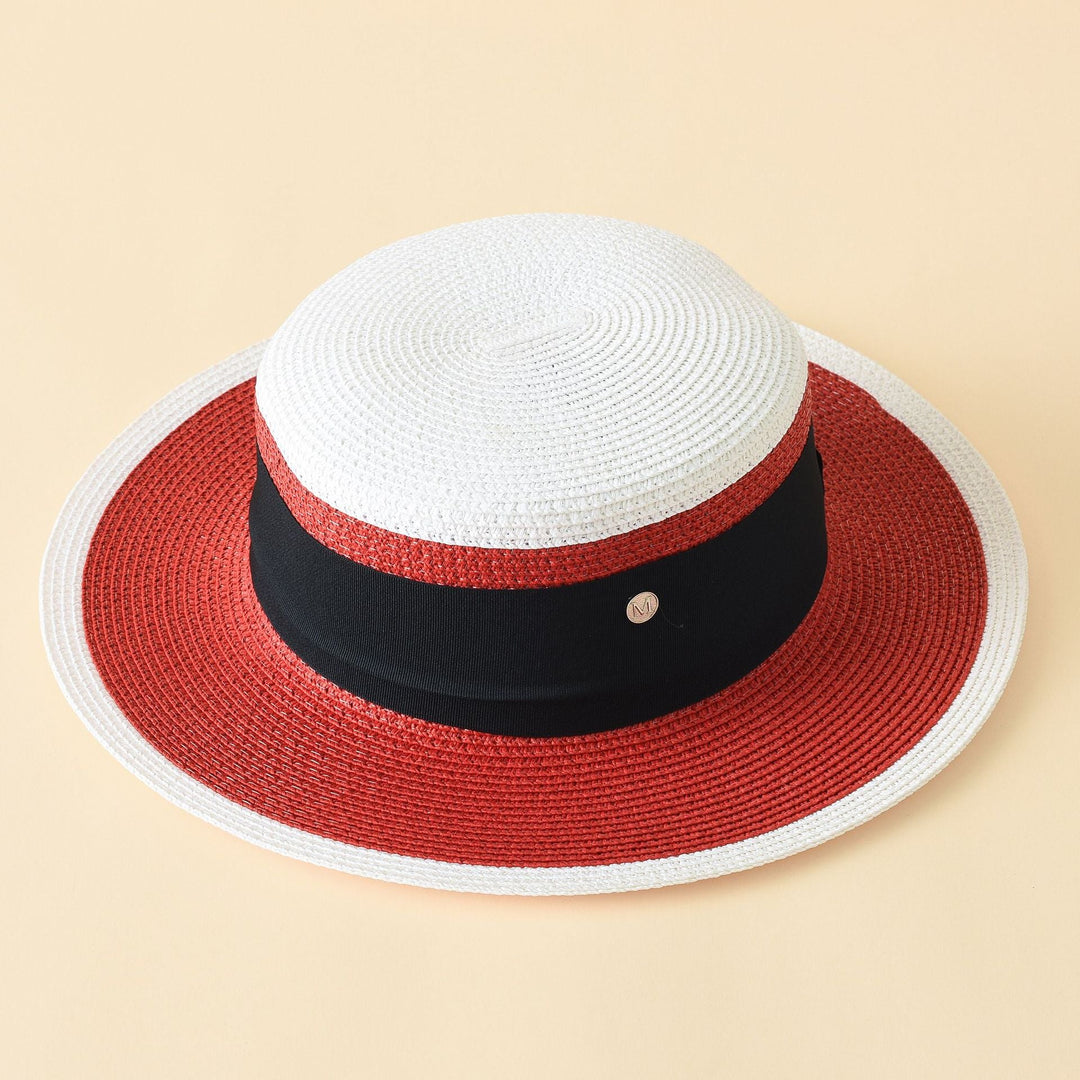 Dams Straw Hat i klassisk Boater-stil med bred brätte och dekorativt band Mirla-Eva Jonsson