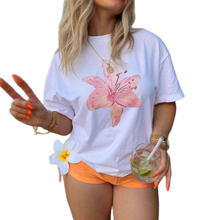 Dams T-shirt med blommigt akvarellmönster och avslappnad passform Mirla-Eva Jonsson