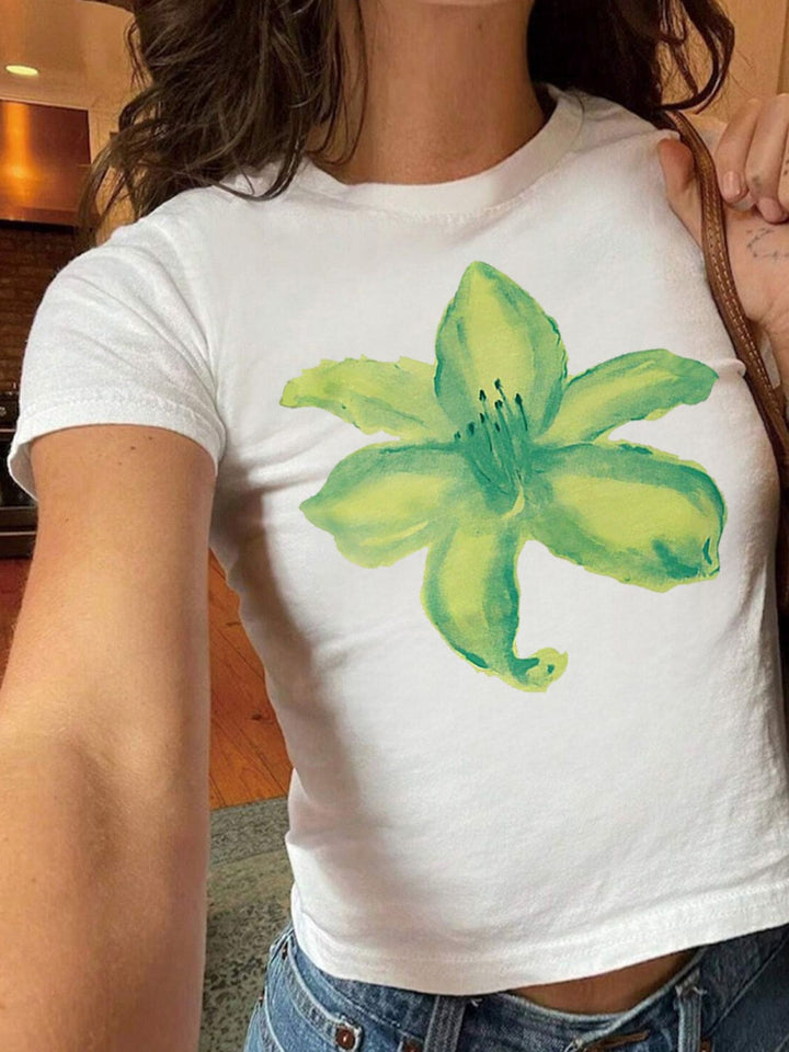 Dams T-shirt med glittrande diskokula-motiv och samtida slinga-detail Mirla-Eva Jonsson