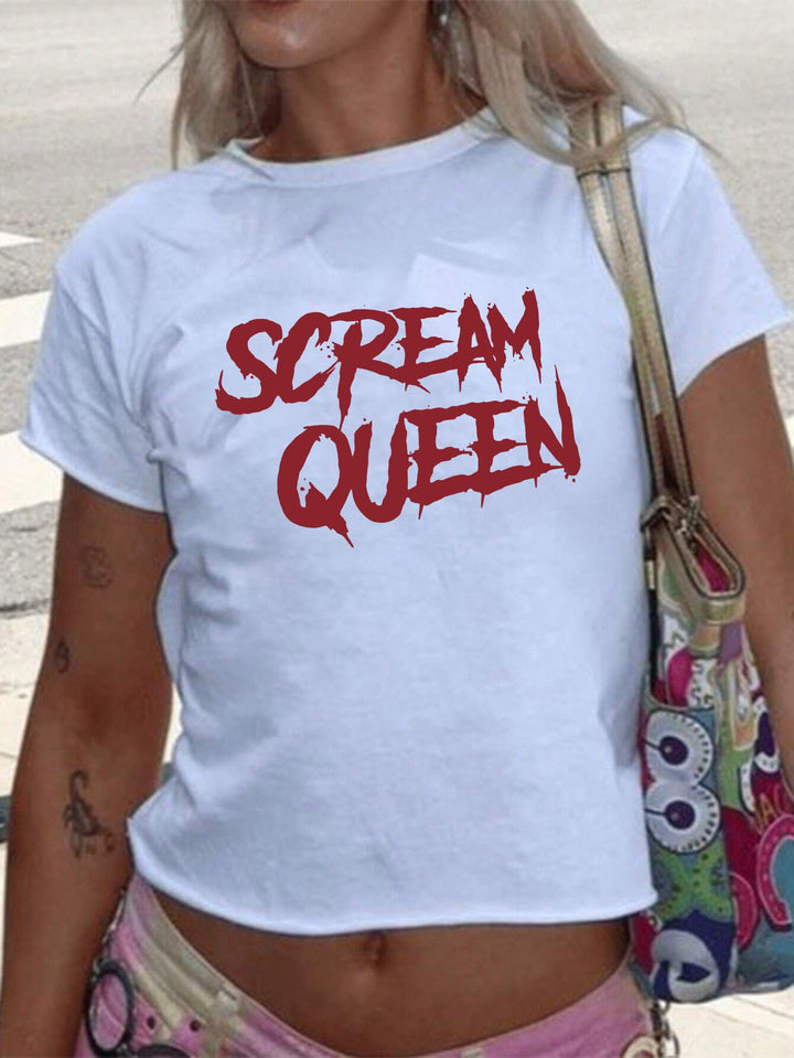 Dams T-shirt med glittrande diskokula-motiv och samtida slinga-detail Mirla-Eva Jonsson