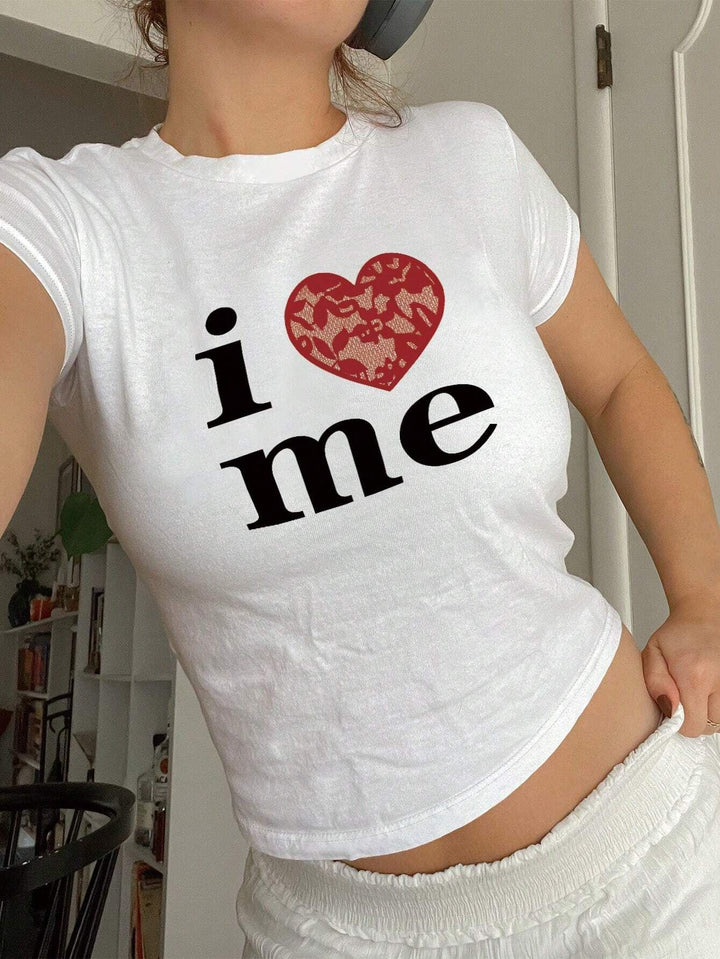 Dams T-shirt med glittrande diskokula-motiv och samtida slinga-detail Mirla-Eva Jonsson