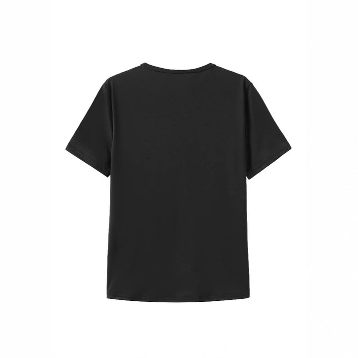 Dams T-shirt med konstnärlig fjärilsdesign och hjärtformad accent Mirla-Eva Jonsson