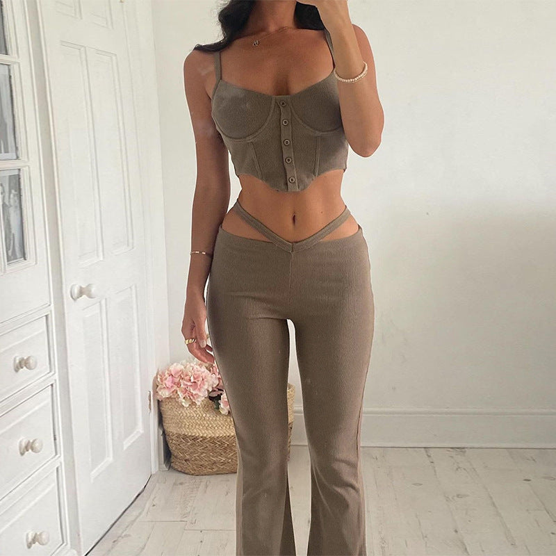 Dams Trendigt Set med Crop-Top med knapppdetaljer och utsvängda byxor Mirla-Eva Jonsson