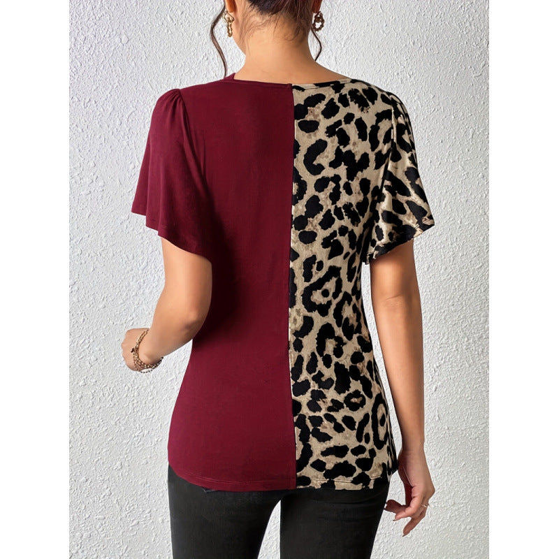 Dams Trendy topp med asymmetrisk design och sofistikerade cut-outs Mirla-Eva Jonsson
