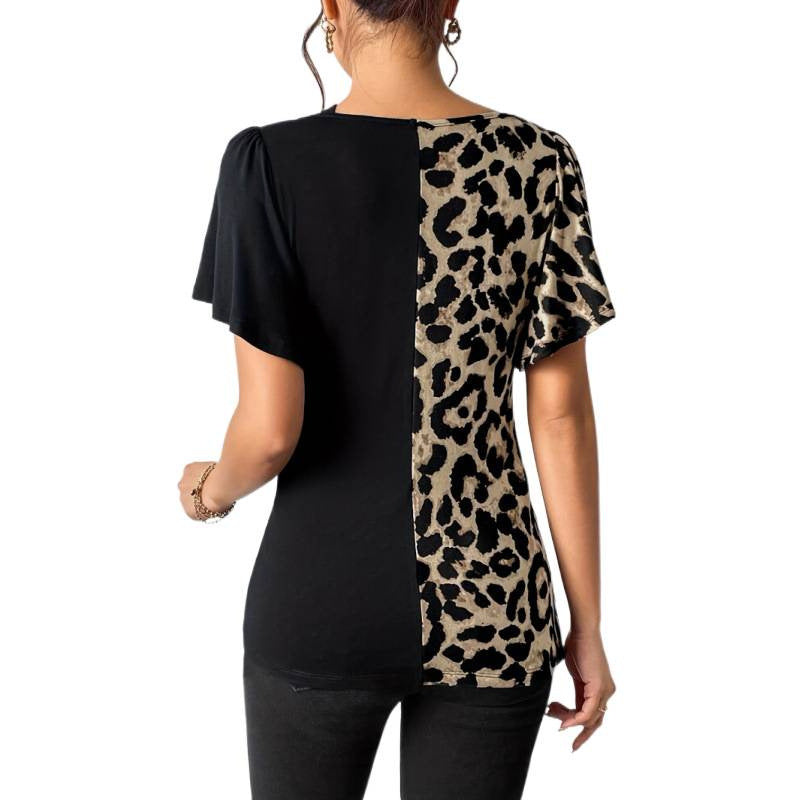 Dams Trendy topp med asymmetrisk design och sofistikerade cut-outs Mirla-Eva Jonsson