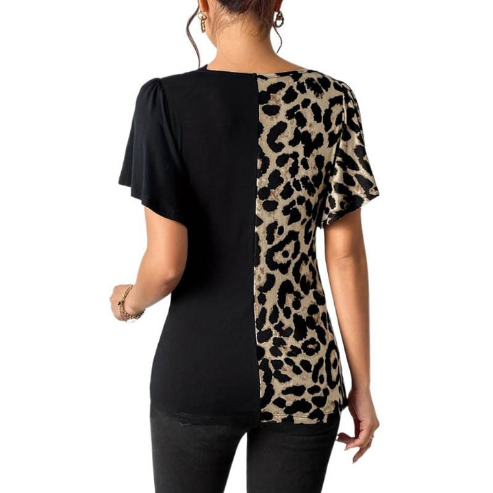Dams Trendy topp med asymmetrisk design och sofistikerade cut-outs Mirla-Eva Jonsson