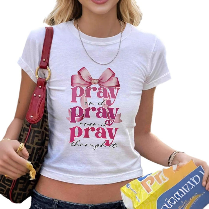Dams ärmlös T-shirt med inspirerande citat och lekfullt rosettmotiv Mirla-Eva Jonsson
