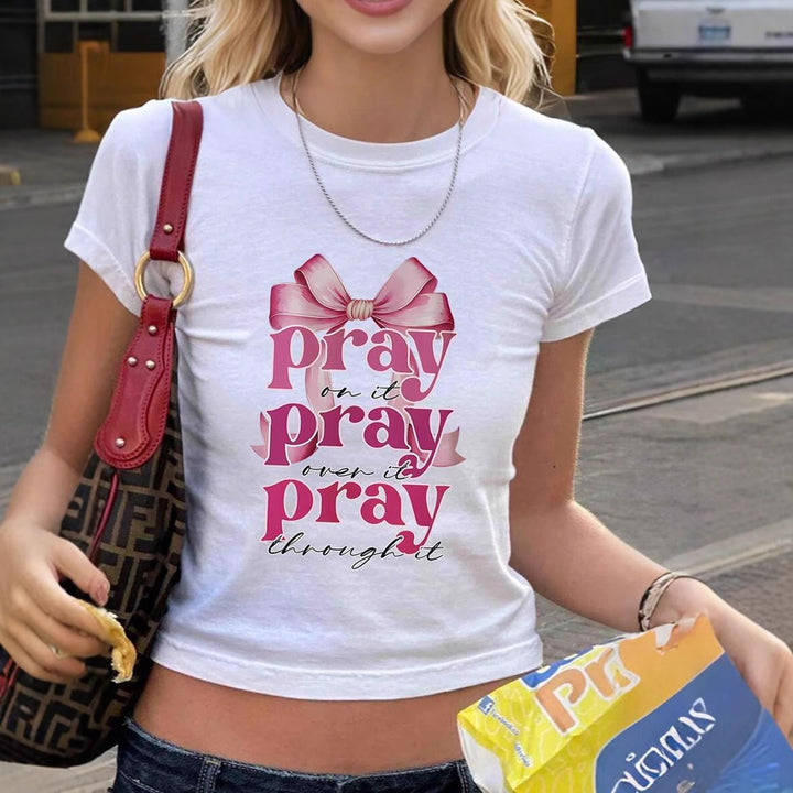Dams ärmlös T-shirt med inspirerande citat och lekfullt rosettmotiv Mirla-Eva Jonsson