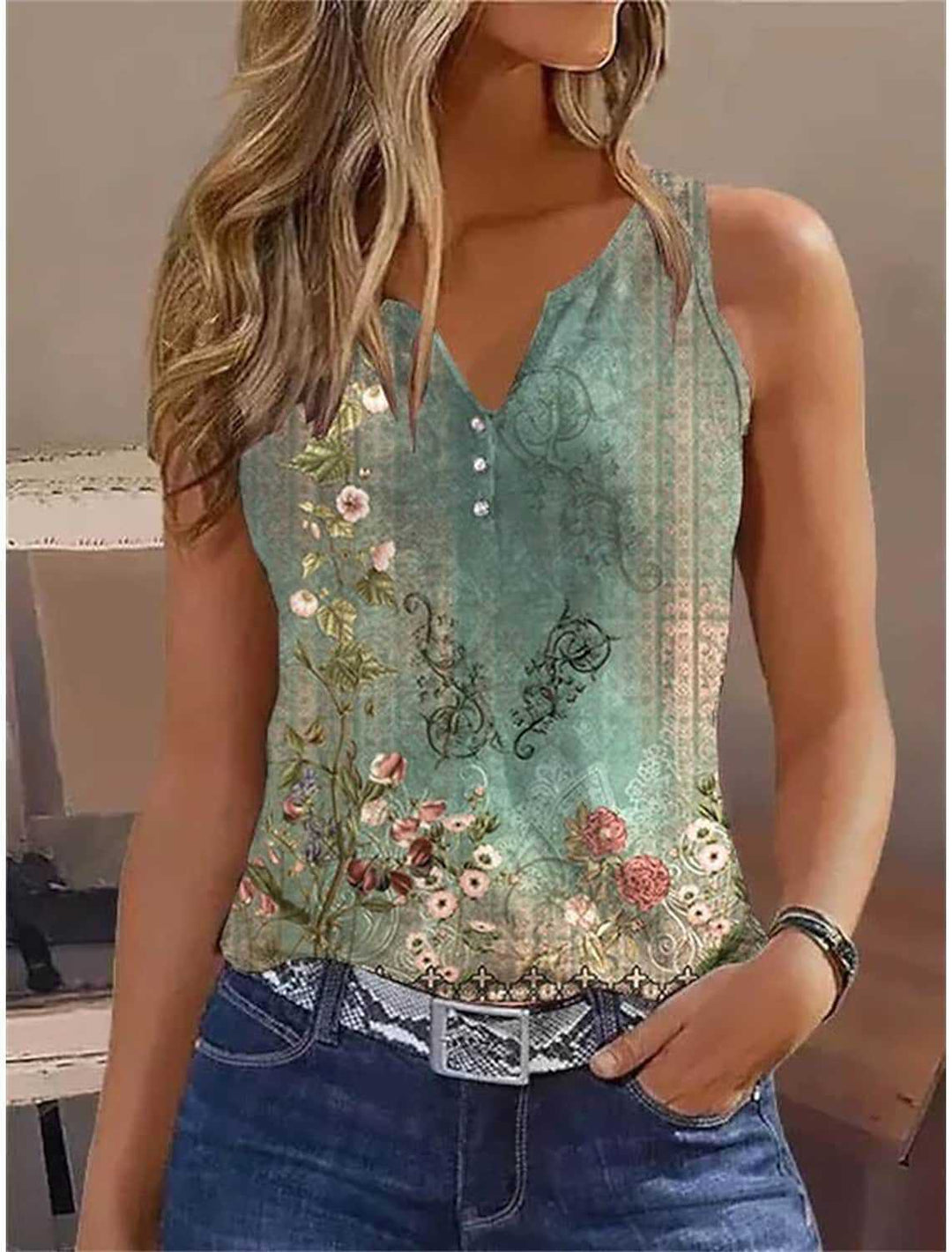 Dams ärmlös designöverdel med blommiga accenter och knapplist Mirla-Eva Jonsson