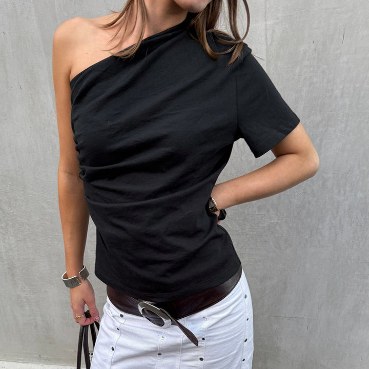 Dams asymmetrisk kortärmad tröja med elegant skärning Mirla-Eva Jonsson