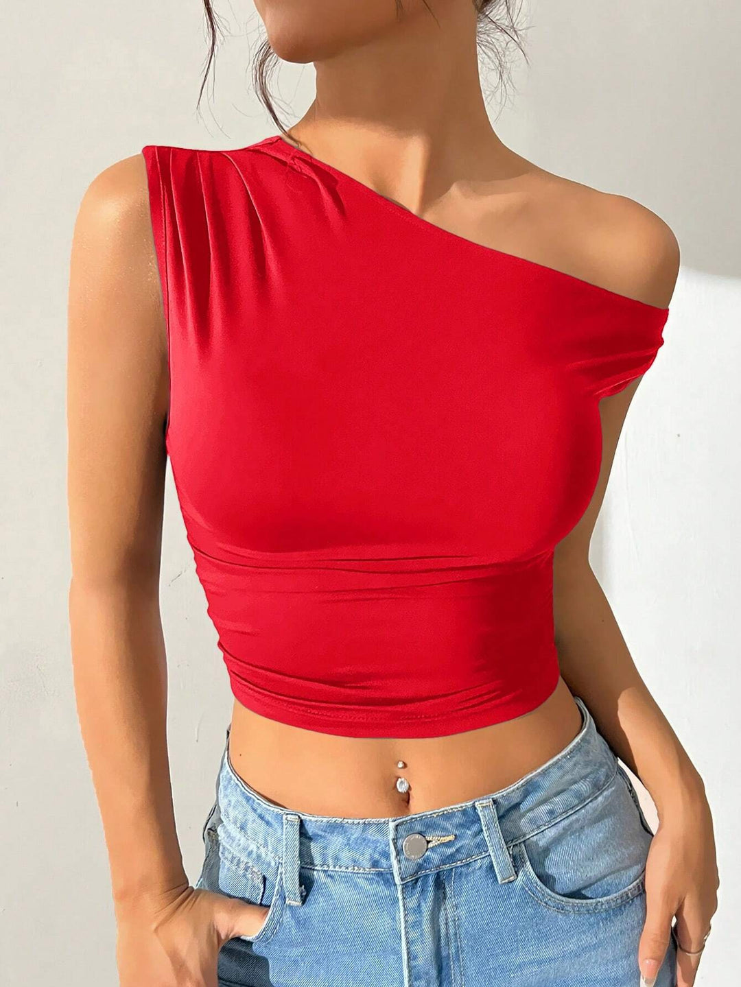 Dams asymmetrisk topp av elastiskt material Mirla-Eva Jonsson