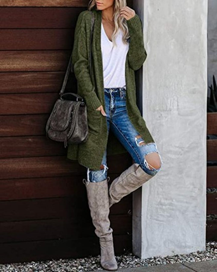 Dams chunky stickad cardigan med avslappnad passform och praktiska fickor Mirla-Eva Jonsson