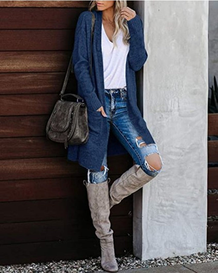 Dams chunky stickad cardigan med avslappnad passform och praktiska fickor Mirla-Eva Jonsson