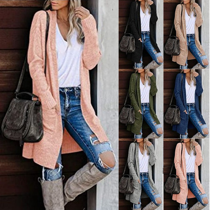 Dams chunky stickad cardigan med avslappnad passform och praktiska fickor Mirla-Eva Jonsson