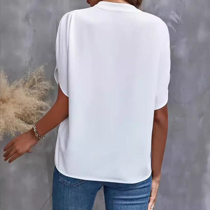 Dams elegant blus med halvlånga ärmar och modern ståkrage Mirla-Eva Jonsson