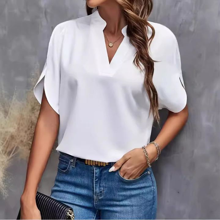 Dams elegant blus med halvlånga ärmar och modern ståkrage Mirla-Eva Jonsson
