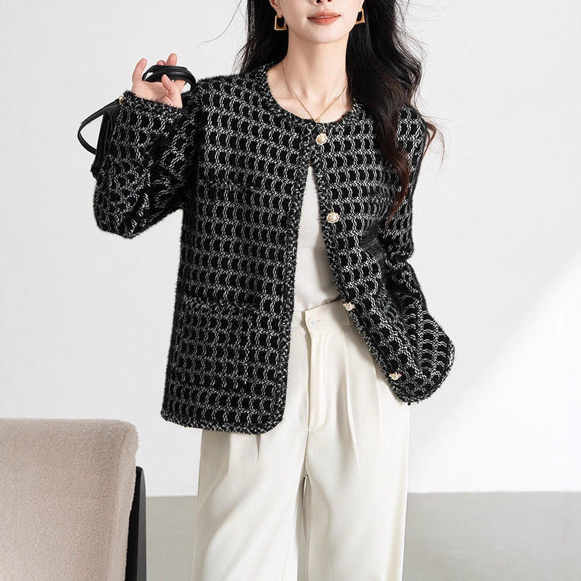 Dams elegant cardigan med texturerat mönster och knappdetaljer Mirla-Eva Jonsson