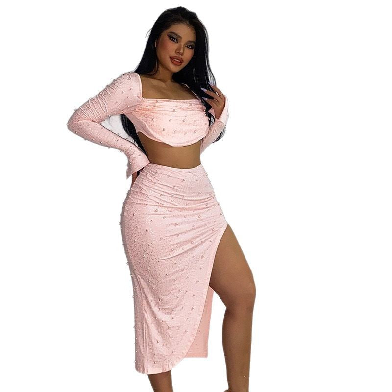 Dams elegant crop top med långa, genomskinliga ärmar och glittrande accenter Mirla-Eva Jonsson