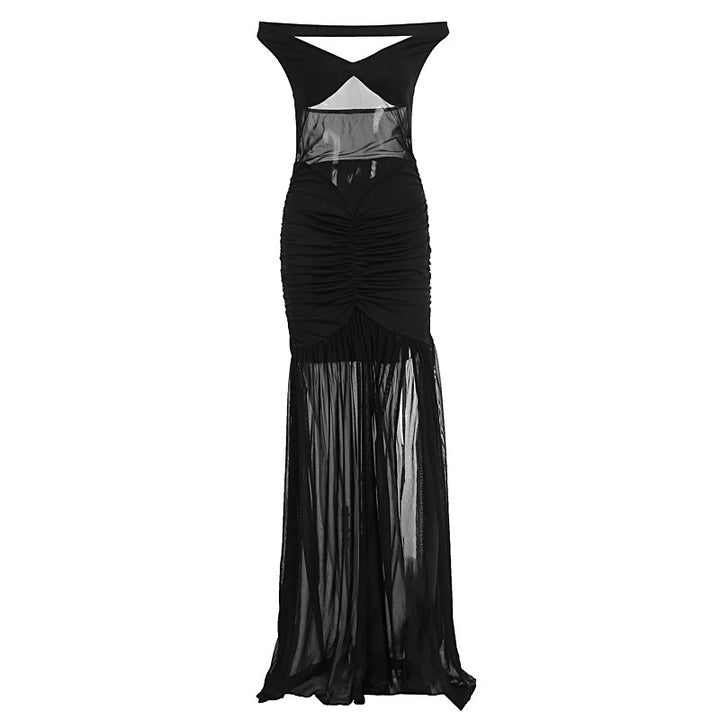 Dams elegant maxiklänning med transparenta inslag och figursydd design Mirla-Eva Jonsson
